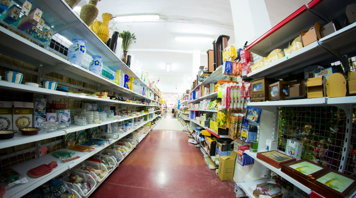 Image of an aisle in a store with products on the shelves
